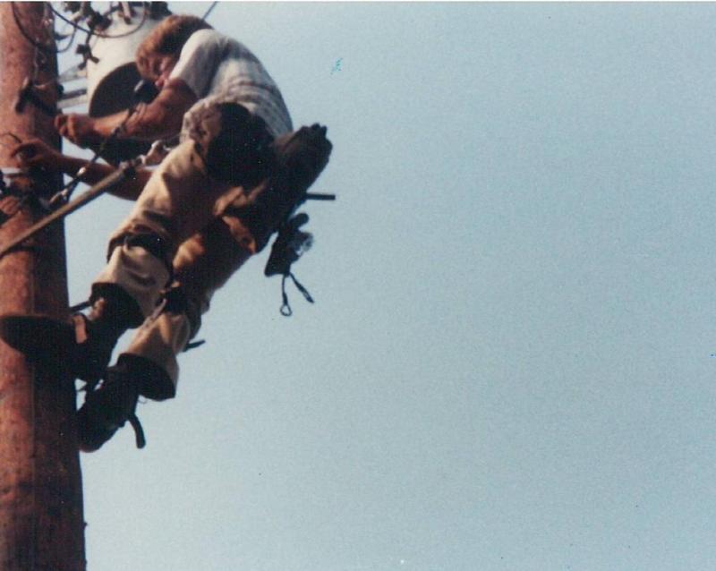 Barry working as a lineman at Middle Tennessee Electric Membership Corp.
